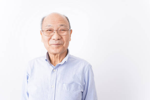 Senior man smiling on white background