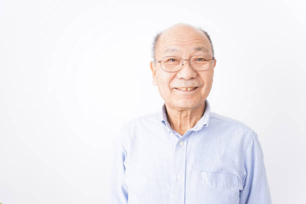 istock Senior man smiling on white background 1181769804