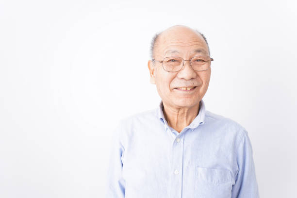 istock Senior man smiling on white background 1181769811