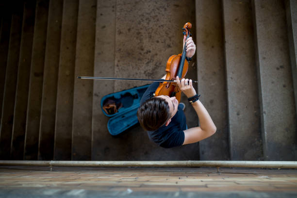 istock Street musician playing violin 1181771508