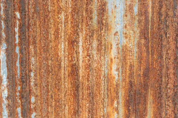 istock Orange Metal rusty background, Metal grunge texture on galvanized iron plate 1181774050