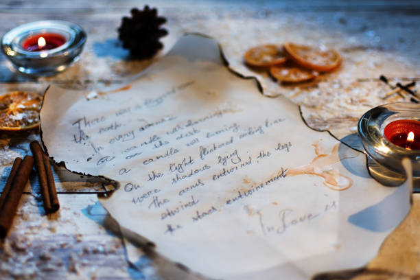 fragment of an old handwritten letter on parchment. winter atmosphere. christmas time. - writing manuscript ancient postcard imagens e fotografias de stock