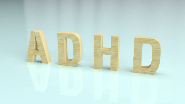 istock The ADHD wood text on glossy plate for medical content 3d rendering. 1181777786