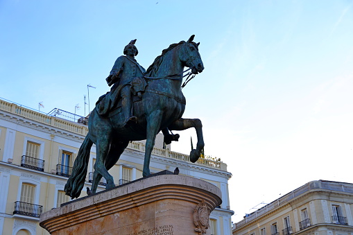 King Charles Equestrian Statue of Carlos III at Puerta del Sol in Madrid, Spain.