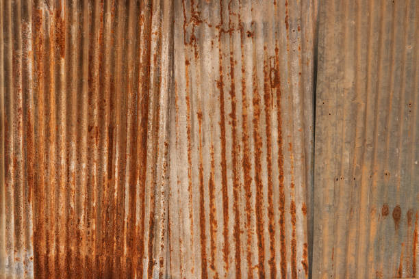 istock Orange Metal rusty background, Metal grunge texture on galvanized iron plate 1181779072