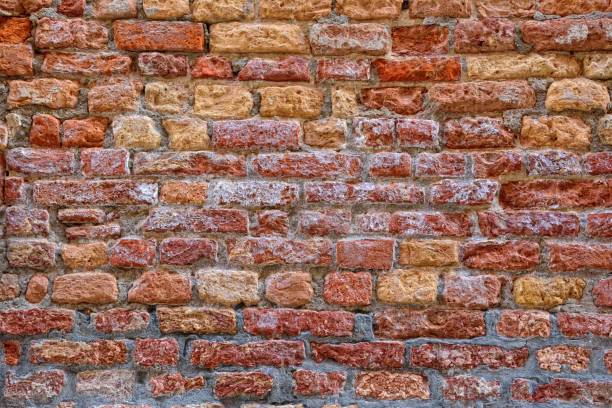 istock Red brick wall with saltpeter and moisture 1181779656