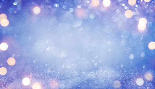 istock Abstract purple and blue defocused glitter vintage lights background 1181784281
