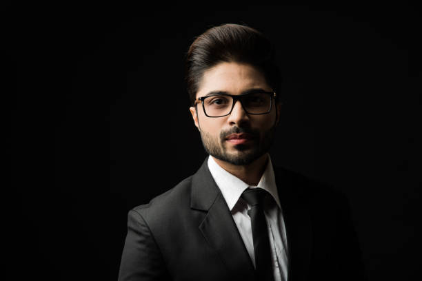 istock Indian Male businessman standing over black background 1181784585