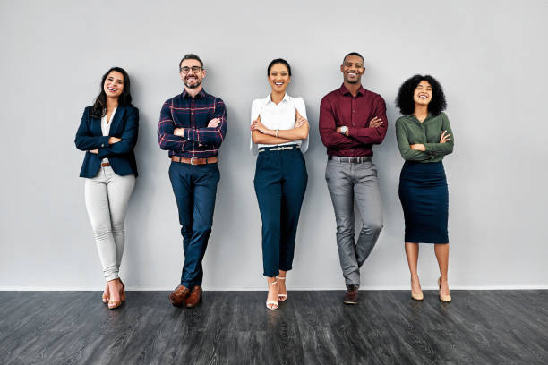 nothing says capability like confidence - people in a row imagens e fotografias de stock