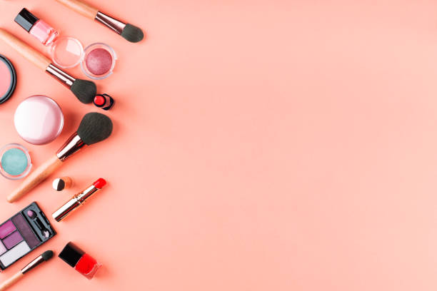 istock Make up products and brushes on pink. Flat lay 1181792792