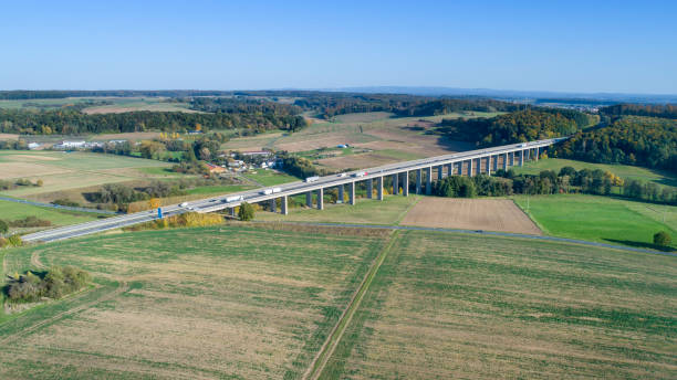 istock Highway bridge, agricultural area - aerial view 1181804802