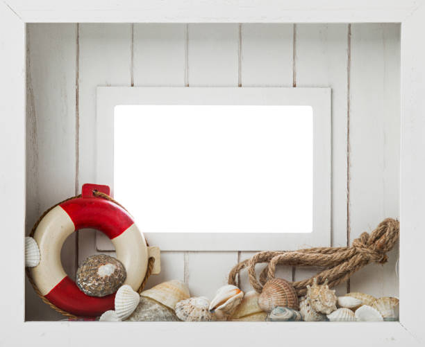 istock Maritime background, wooden white frame decorated with sea shells, rope and liee belt 1181809020