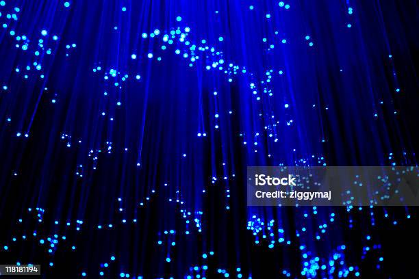 High Tech Fiber Optics Abstract Background In Blue Stock Photo - Download Image Now - Abstract, Backgrounds, Black Color