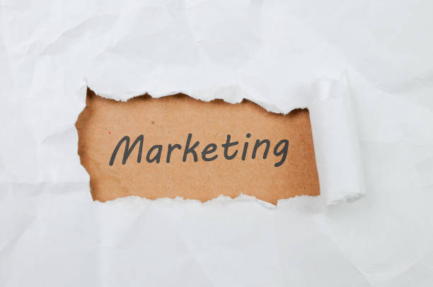 istock Marketing sign on old papper texture 1181812279