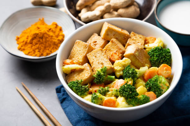 istock Stir fried tofu with vegetables and satay sauce 1181820723