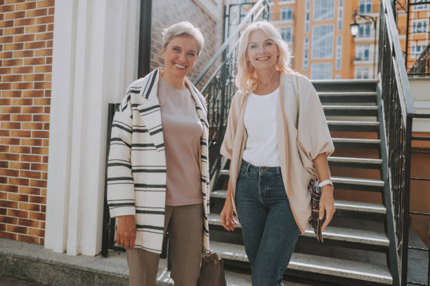 istock Joyful trendy women looking in front of them 1181823171