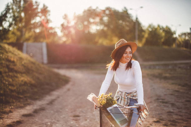 Woman in nature with her bicycle