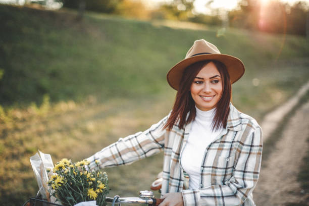Woman in nature with her bicycle