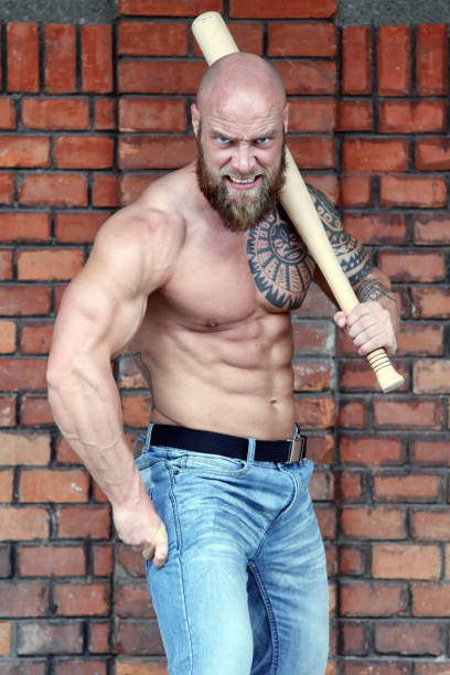 Hooligan Powerful hooligan with baseball bat chest tattoos for men designs stock pictures, royalty-free photos & images