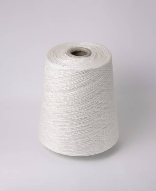 istock bobbin of yarn on a white background. Side view.Textile reel on isolated white background. 1181832892