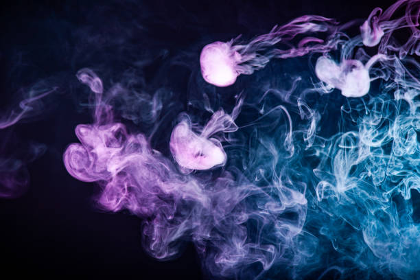 istock Abstract colorful smoke on black background . 1181834046