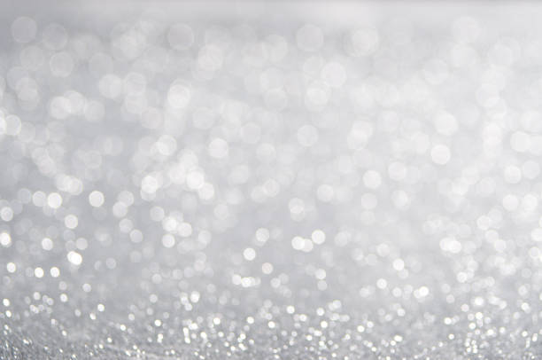 istock Abstract of Bright and sparkling bokeh background. silver and diamond dust bokeh blurred lighting from glitter texture 1181834087
