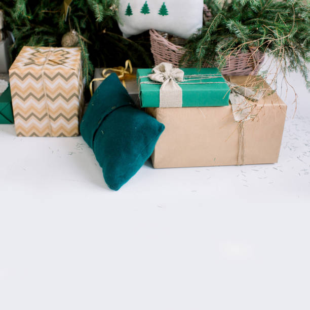 istock Christmas boxes with gifts lying on a white background 1181837784