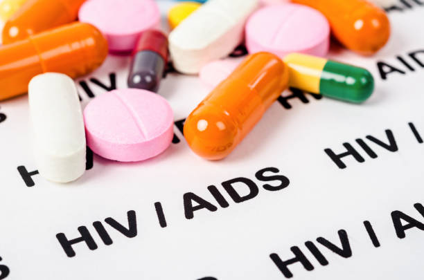Pills on Hiv aids paper stock photo