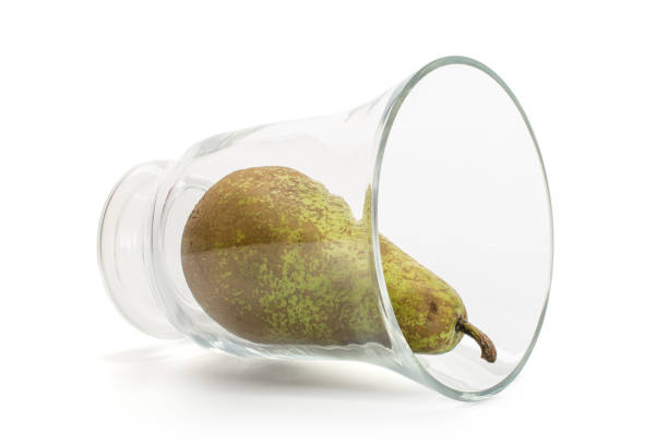 istock Fresh green conference pear isolated on white 1181841650