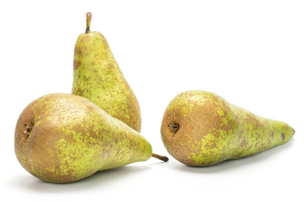 istock Fresh green conference pear isolated on white 1181841658