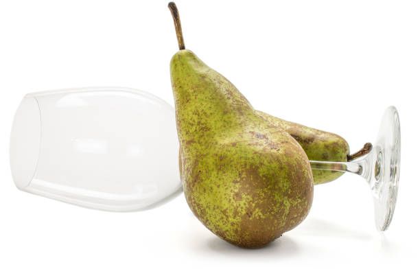 Fresh green conference pear isolated on white