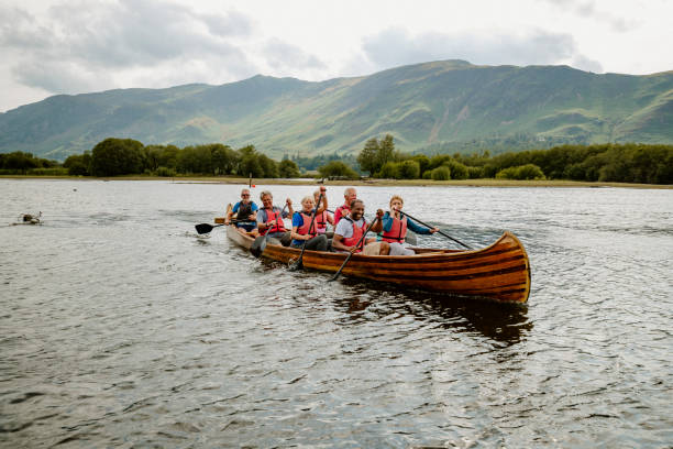 istock Friends Out Having Fun Sailing In The Lakes 1181841946