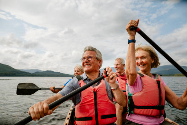 istock Seniors Enjoying And Having Fun In Rowing Boat 1181843467