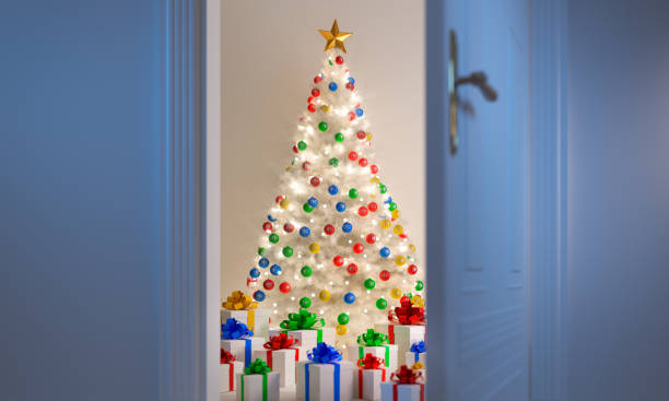 istock White Christmas Tree with colored Balls and Gift Boxes 1181843700