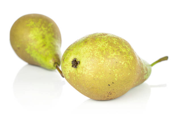 istock Fresh green pear isolated on white 1181845085