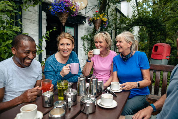 istock Group Of Seniors Drinking Tea And Sharing A few Jokes 1181845381