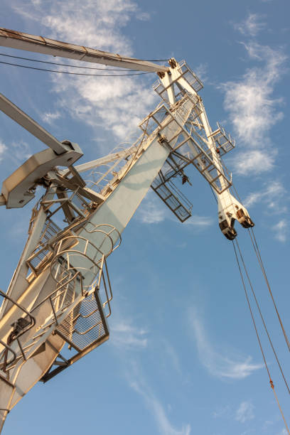 istock crane arm in a port 1181846214
