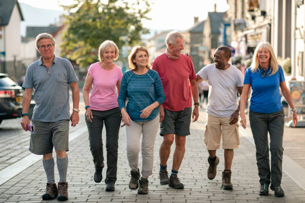 istock Mature Friends Walking 1181846290