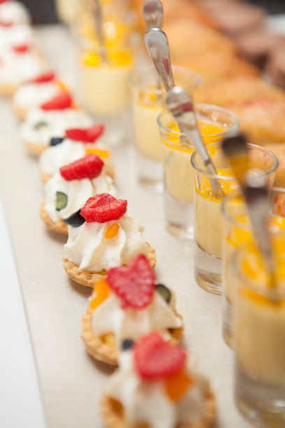 Rows of colourful mini desserts