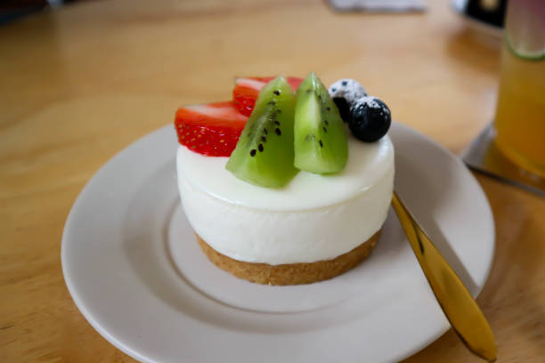 istock cheesecake or cheese cake with strawberry and kiwi fruit topping 1181846539