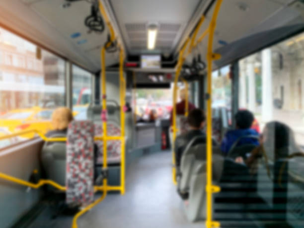 istock Blurred people standing on the bus 1181848050