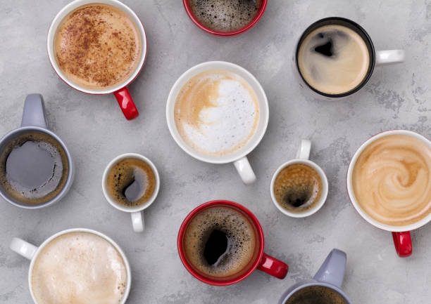 istock Various coffee in different cups on the concrete gray background 1181848133