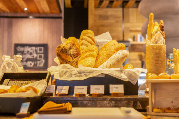 istock Modern bread counter with large fresh bakery products. 1181851389
