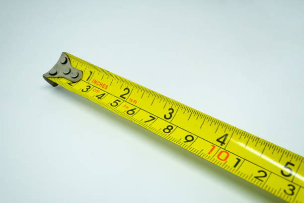 istock Yellow measuring tape isolated cut out 1181851686