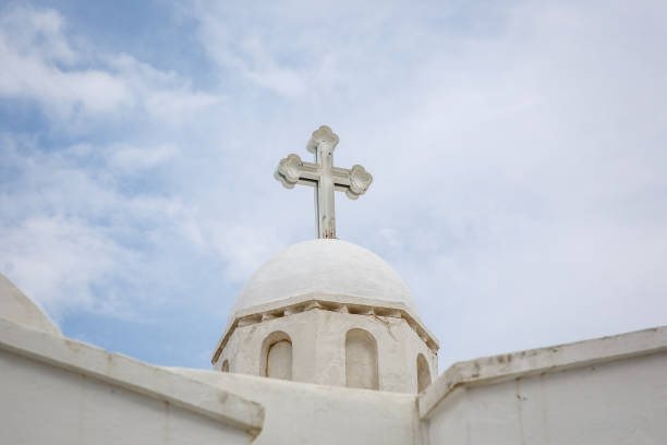 istock White cross on a greek church. 1181851742