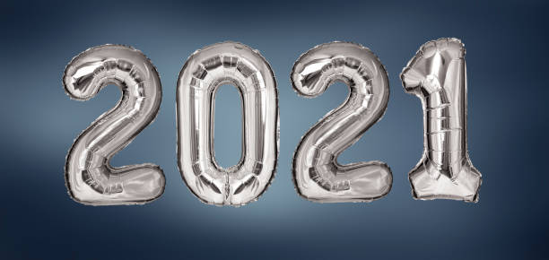 istock New Year 2021 silver balloons on blue background 1181855488