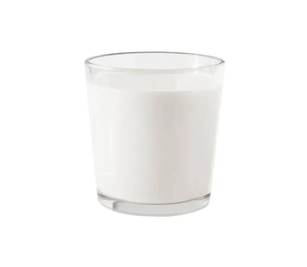 Photo of Milk in glass transparent cup isolated