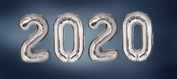 istock New Year 2020 silver balloons on blue background 1181855647