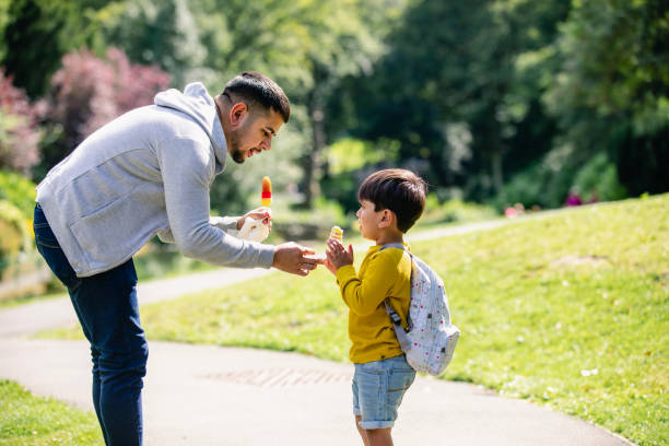 istock Enjoying Ice Lollies 1181857960