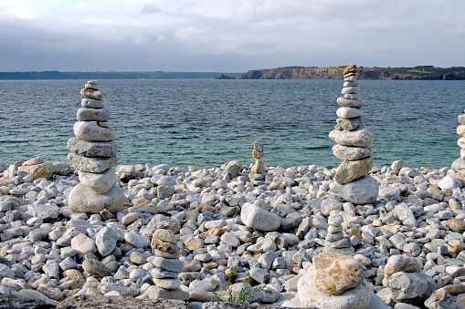Camaret-sur-Mer, France. Rock stackings in the coast, with the sea in the background